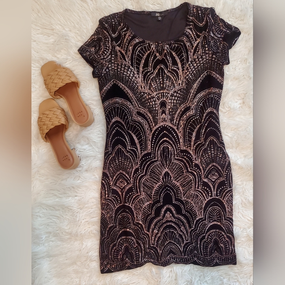 Dress with sequin look. Size Medium. Falls just above knee if 5'3".